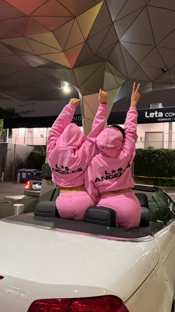 Loud Minds Club Pink Hoodie in bubblegum pink cotton fleece, oversized, side view