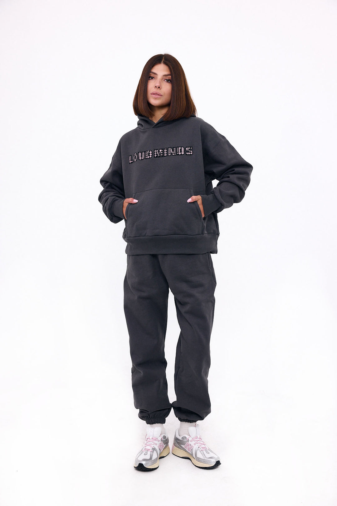 Loud Minds Your Favorite Fleece Hoodie in charcoal organic cotton fleece, back view