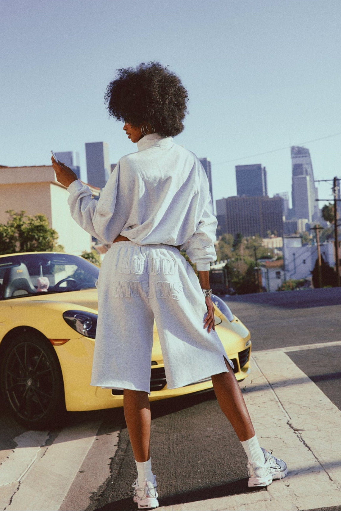Heather grey Loud Minds Baddie Baggy Sweat Shorts, oversized cotton fleece, side view