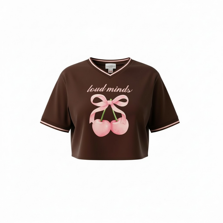 Brown crop top with pink cherries and text on a white background