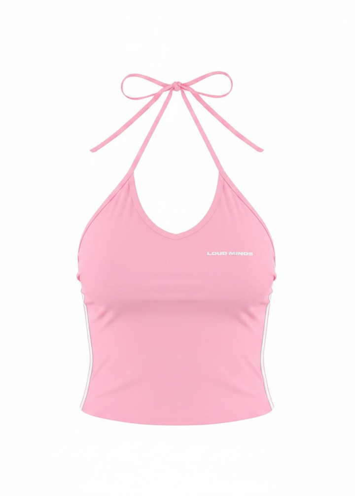 Pink crop top with halter neck and tied straps on a white background